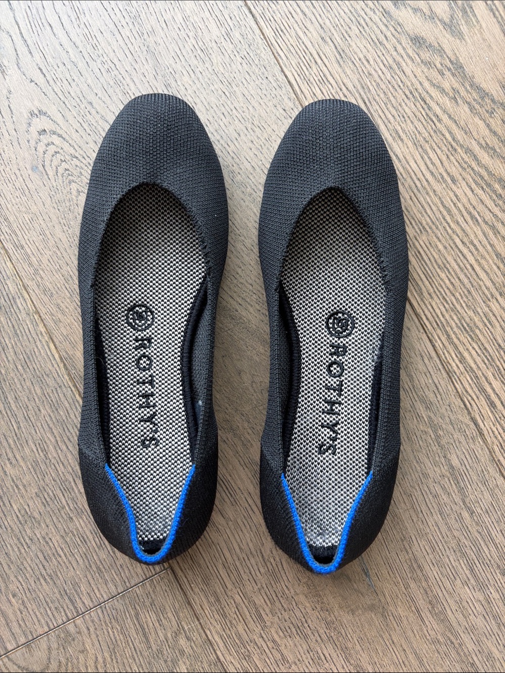 Rothy's Black Knit Ballet Flats with Blue Heel Trim